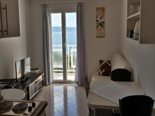 Apartments Bandalo One Bedroom Apartment with Sea View — 4-Star Luxury Hotel in Podstrana, Croatia