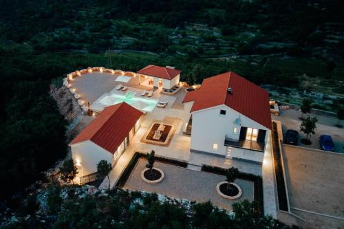 Vila Agape with a pool football and tennis court — 4-Star Luxury Hotel in Lovrec, Croatia