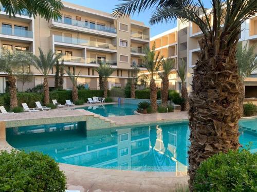Beau Duplex Avec Terrasse - carbon neutral hotel in Marrakesh