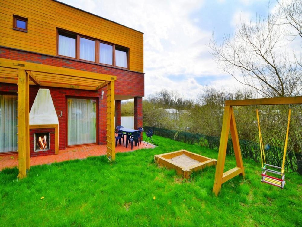 Holiday home with garden close to the beach — 4-Star Luxury Hotel in Mielno, Poland
