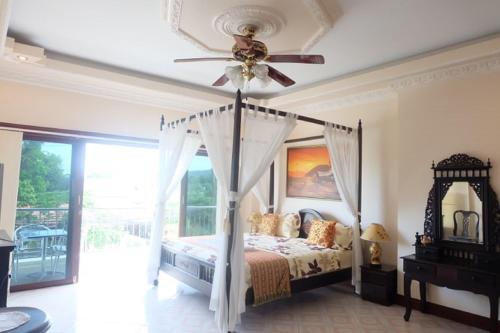 Majestic Villas Guesthouse Phuket. — 4-Star Luxury Hotel in Rawai, Thailand