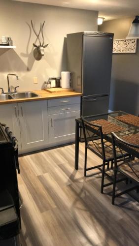 Four Cedars Accommodation - carbon neutral hotel in Jasper Park Lodge