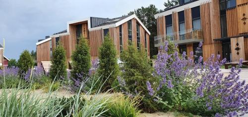 Apartamentas Plunksna — 4-Star Luxury Hotel in Nida, Lithuania