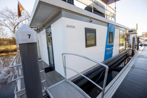 Hausboot Seestern - carbon neutral hotel in Unknown City