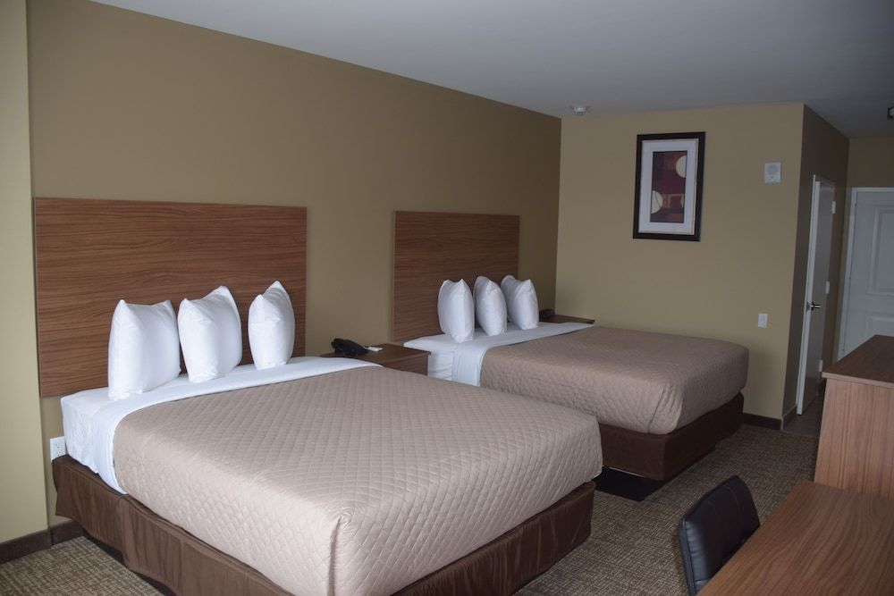 Astoria Delancy Inn and Suites - photo 11