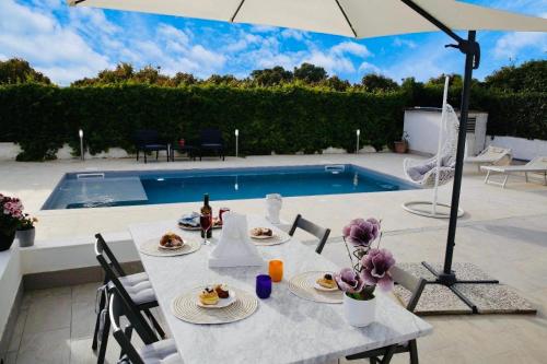 Libero House A Private Pool Oasis — 4-Star Luxury Hotel in Siracusa, Italy