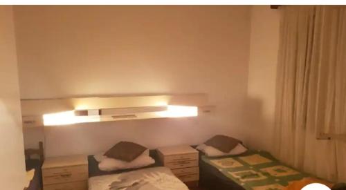 Trokrevetna soba sa zajednickim kupatilom - last minute hotel in Budva
