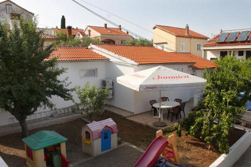 Family friendly seaside apartments Preko Ugljan 8232 — 5-Star Luxury Hotel in Povljana, Croatia
