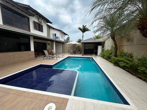 Ótimo sobrado Jardim Pernambuco II - last minute hotel in Guaruja