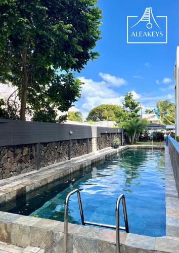 Sandy Feet Spacieux T4 Climatisé avec Piscine & Parking à Pereybere — 4-Star Luxury Hotel in Cap Malheureux, Mauritius