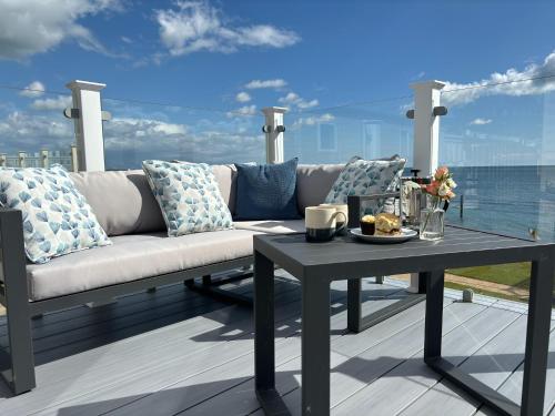 Regal Beachside pitch 22 Creek Caravan Park in Ringstead, United Kingdom