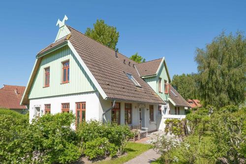 Ferienhaussiedlung Strandperlen Sanddornhof 2c — carbon neutral stay, Wustrow
