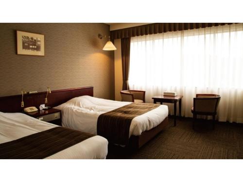 Tsuyama Kakuzan Hotel Vacation Stay 75704V — hotel in Tsuyama