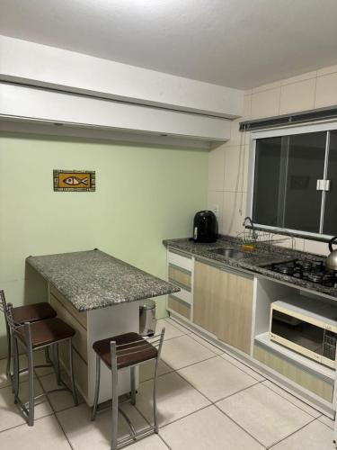 Kitnet no Centro de Bombinhas - last minute hotel in Unknown City