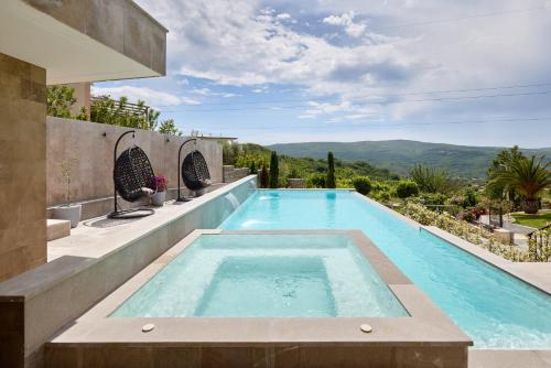 Villa Oaza with Outdoor Pool — 4-Star Luxury Hotel in Kotor, Montenegro