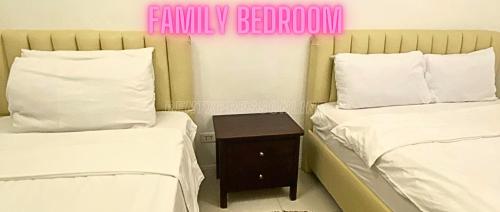 Family Room Affordable Cheapest Deluxe Double Unit in Manila with 2 Balconies & 2 Bathrooms 25 Percent Discount Free Sauna & Pool Access Near Manila Bay Robinsons Place Ermita Pgh Bellagio UP Pedrogil US Embassy NAIA Airport Updated 2024 — 4-Star Luxury Hotel in Manila, Philippines