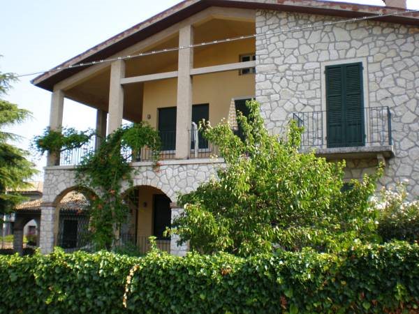 Residence Le Logge — 4-Star Luxury Hotel in Torri Del Benaco, Italy