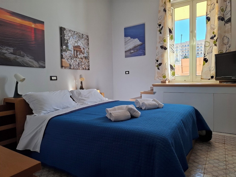 Palazzo Caratozzolo Attico — 4-Star Luxury Hotel in Agrigento, Italy