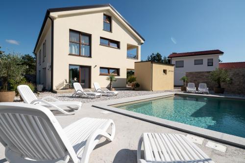 Apartments Kras 24 with Pool — 4-Star Luxury Hotel in Sezana, Slovenia