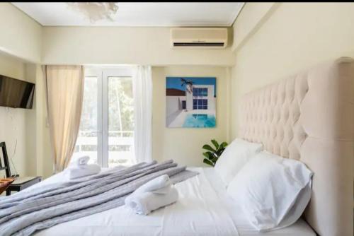Vouliagmeni Thalassa Apartment — 4-Star Luxury Hotel in Vouliagmeni, Greece