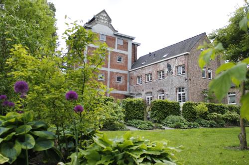 Housing De Brouwerij — 4-Star Luxury Hotel in Westdorpe, Netherlands