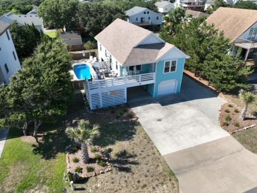 Somewhere On A Beach 4 bedroom Private Pool Hot Tub Fire Pit Game Room Horseshoe Pits Walk to beach Sound arcade and go carts — 4-Star Luxury Hotel in Kill Devil Hills, United States