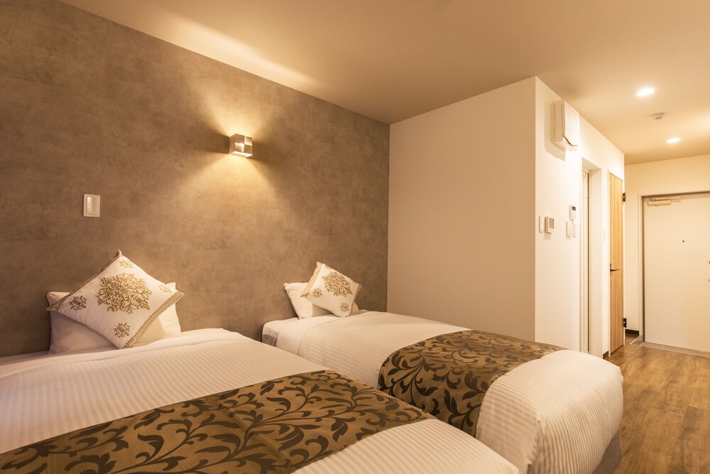 Mr.Kinjo Rinzu Rycom - carbon neutral hotel in Okinawa