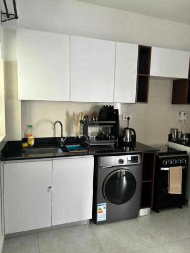 1 Bedroom with a Washing Machine