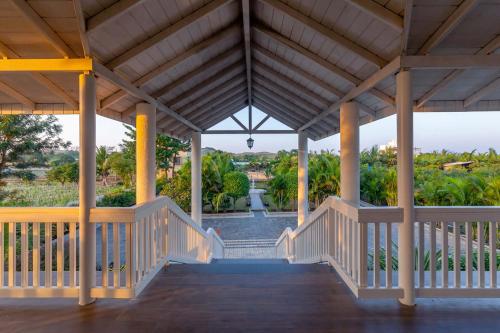 StayVista's Lake La Vie Tranquil Lake View Villa Amidst Farmland with Pool and Poolside Gazebo Proximity to Sula — 5-Star Luxury Hotel in Nashik, India