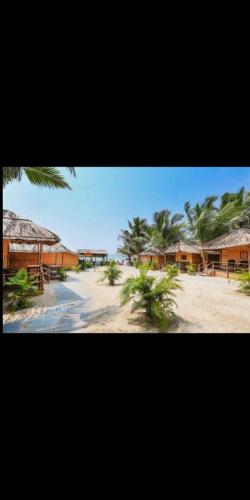 Blue Corner Beach Huts & Restaurant - carbon neutral hotel in Benaulim