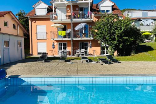 Das Schneckenhaus Ferienwohnung mit Pool & Seeblick — 4-Star Luxury Hotel in Reichenau, Germany