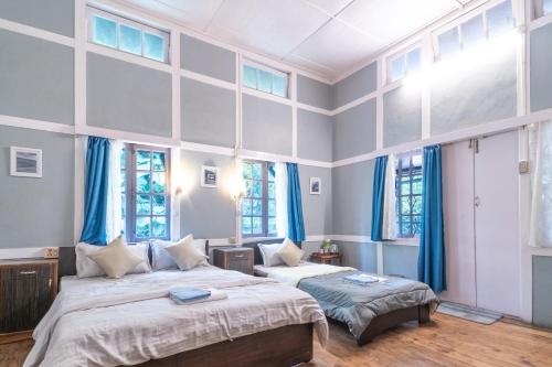 The Cinnamon Tree by Timberwolves in Shillong, India