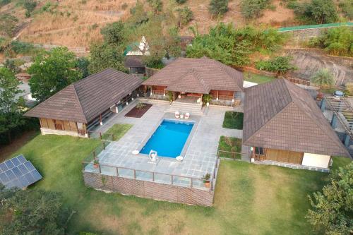 StayVista's Vyoman Villa Experience a valley view lush lawn spa and yoga retreat — 4-Star Luxury Hotel in Lonavla, India