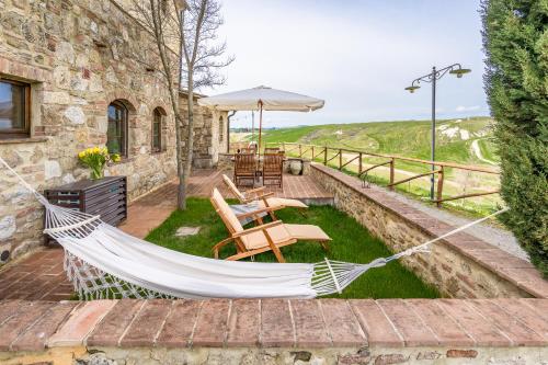 Podere Fossaccio Casa Cipresso — 4-Star Luxury Hotel in Asciano, Italy