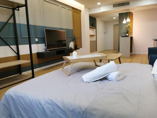 Agrowth At Aru Suites — 4-Star Luxury Hotel in Kota Kinabalu, Malaysia