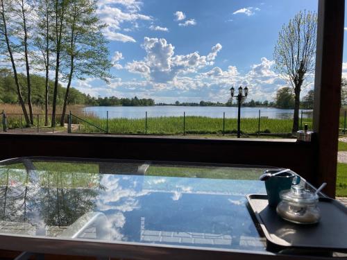 Bajkowa Przystań domki nad jeziorem in Unknown City, Poland