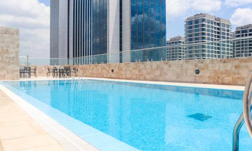 Nzuri Elite 1 bedroom with a Pool Gym workstation & near National Museum JW Marriott's Kempinski and Banks