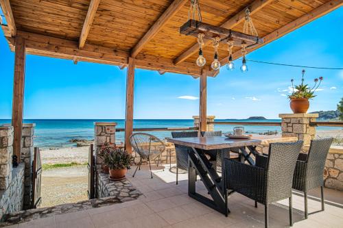 Pearl of Stegna Beach House — 4-Star Luxury Hotel in Archangelos, Greece