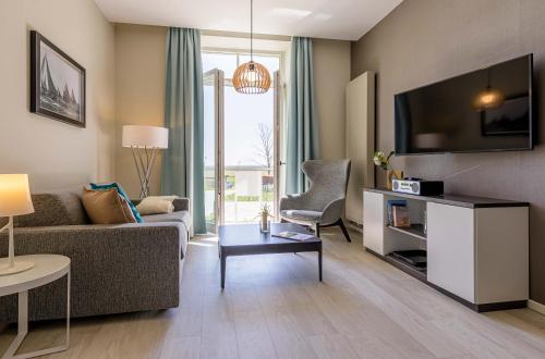 Sonnenblume in der Seefahrtschule — 4-Star Luxury Hotel in Wustrow, Germany