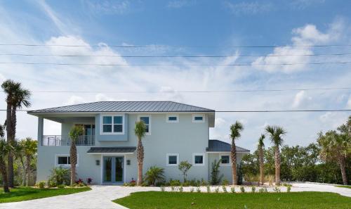 Riverfront Oasis with Ocean Views Steps from Car Free Beach 6090T in New Smyrna Beach, United States