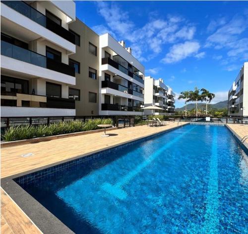 Resort piscina aquecida suíte e churrasqueira - carbon neutral hotel in Florianopolis