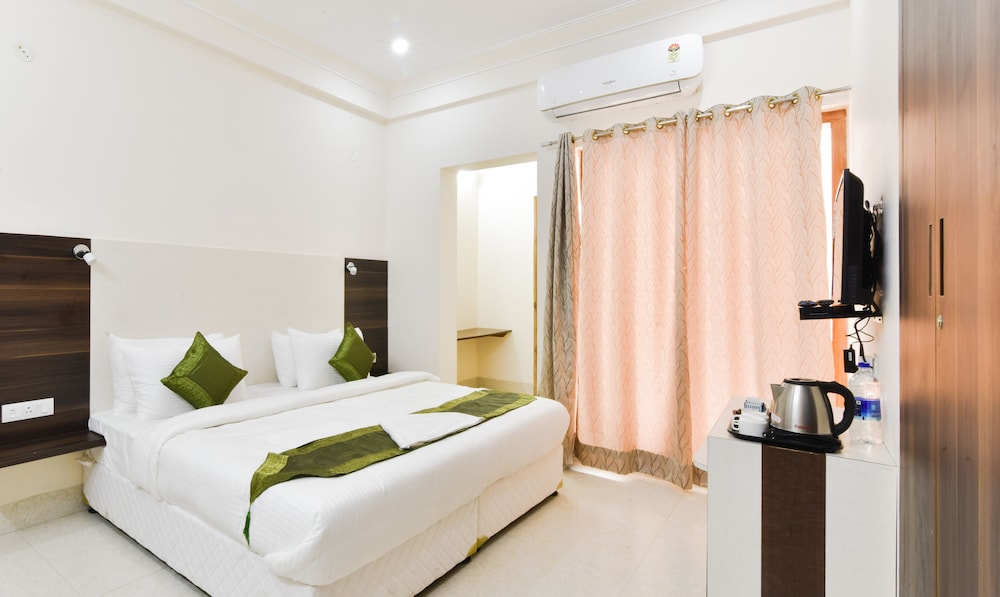 Pacific Inn Essence by Treebo Hotels
