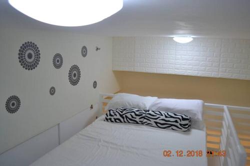 SMDC Wind Residences 102 Loft Bedroom Facing Amenities with WIFI and Parking — 4-Star Luxury Hotel in Tagaytay, Philippines
