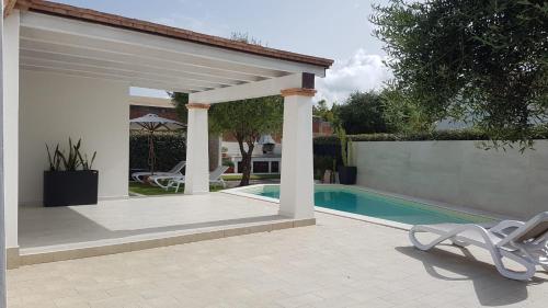 VILLA ILARIA con piscina privata a 350 mt spiaggia di sabbia — 4-Star Luxury Hotel in Tertenia, Italy