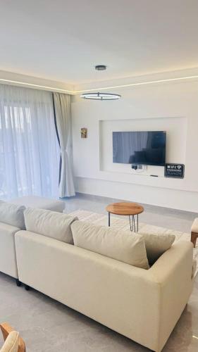Elegantly furnished two bedroom apartment with all modern finishes swimming pool gym and stunning views in lavington