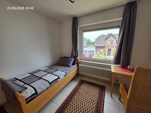 Ein bequemes Zimmer in einer ruhigen Umgebung Näher Zentrum mit gemeinsam genutzte Bad und Küchengeräte — hotel in Kleve
