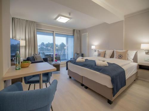Dünenresidenz Prora 1 Raum Ferienwohnung mit Meerblick 1 Schlafzimmer und Balkon NP 416 — 4-Star Luxury Hotel in Ostseebad Binz, Germany