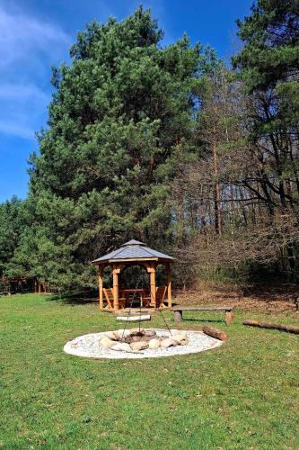 Wood Land Liswarta Domki W Drzewach 19808255 — Popow
