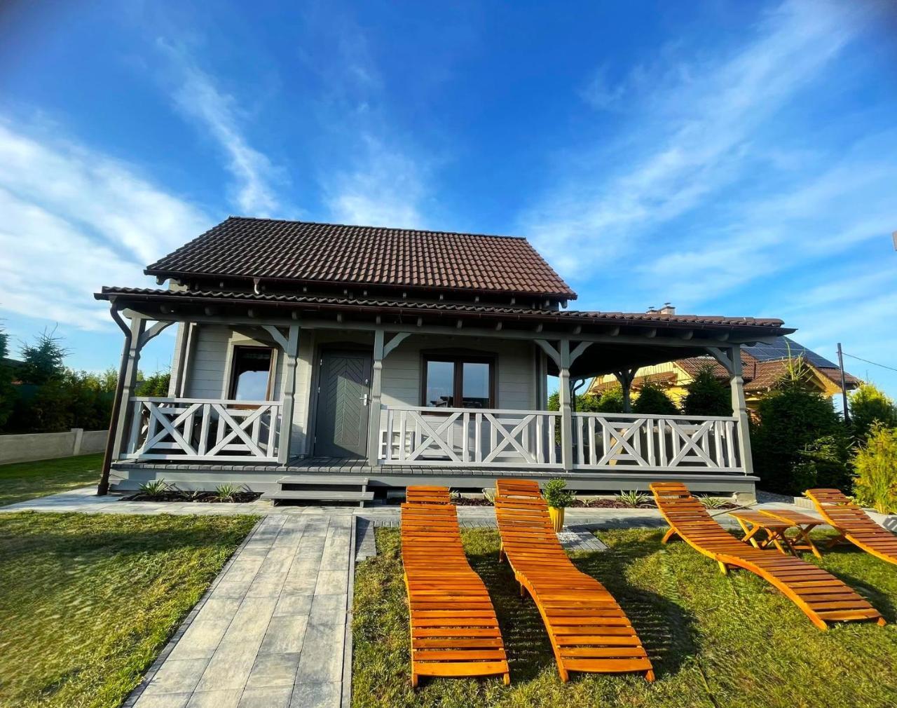 Fiołkowy Zakątek Domek z Basenem in Mikolajki, Poland