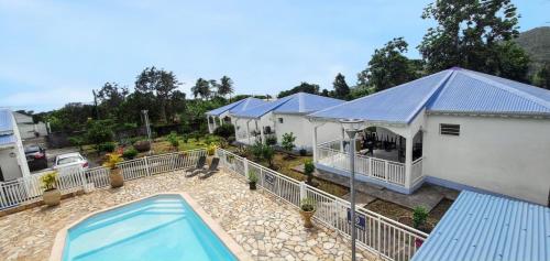 Bungalow charmant à Capesterre Belle Eau avec piscine partagée — 4-Star Luxury Hotel in Capesterre-Belle-Eau, Guadeloupe